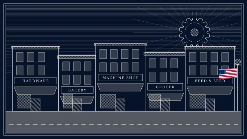Engraved-style scene of a small-town main street lined with storefronts — hardware, bakery, machine shop, grocer, feed and seed — with a gear in the sky and a small American flag on a lamppost.